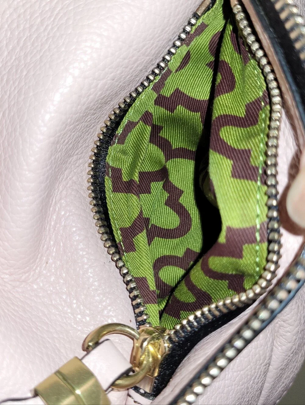 Oryany Blush Leather Shoulder Bag with Gold Turn-Lock Top Zip Bag.